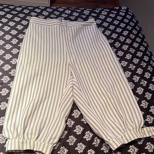 White and blue striped mid length slacks